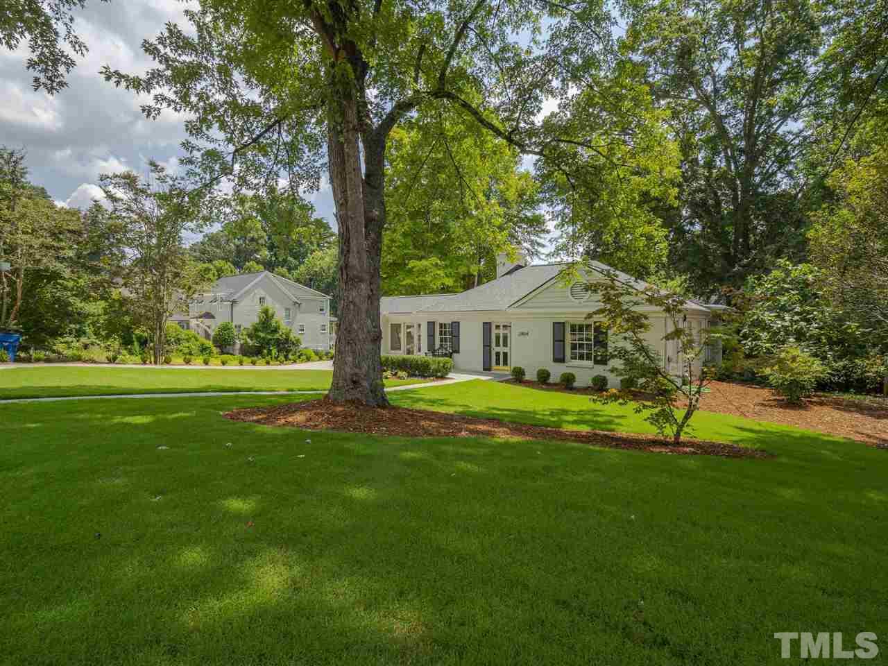2804 Anderson Drive Raleigh, NC 27608 - Photo 3 of 23 a house with garden in front of it