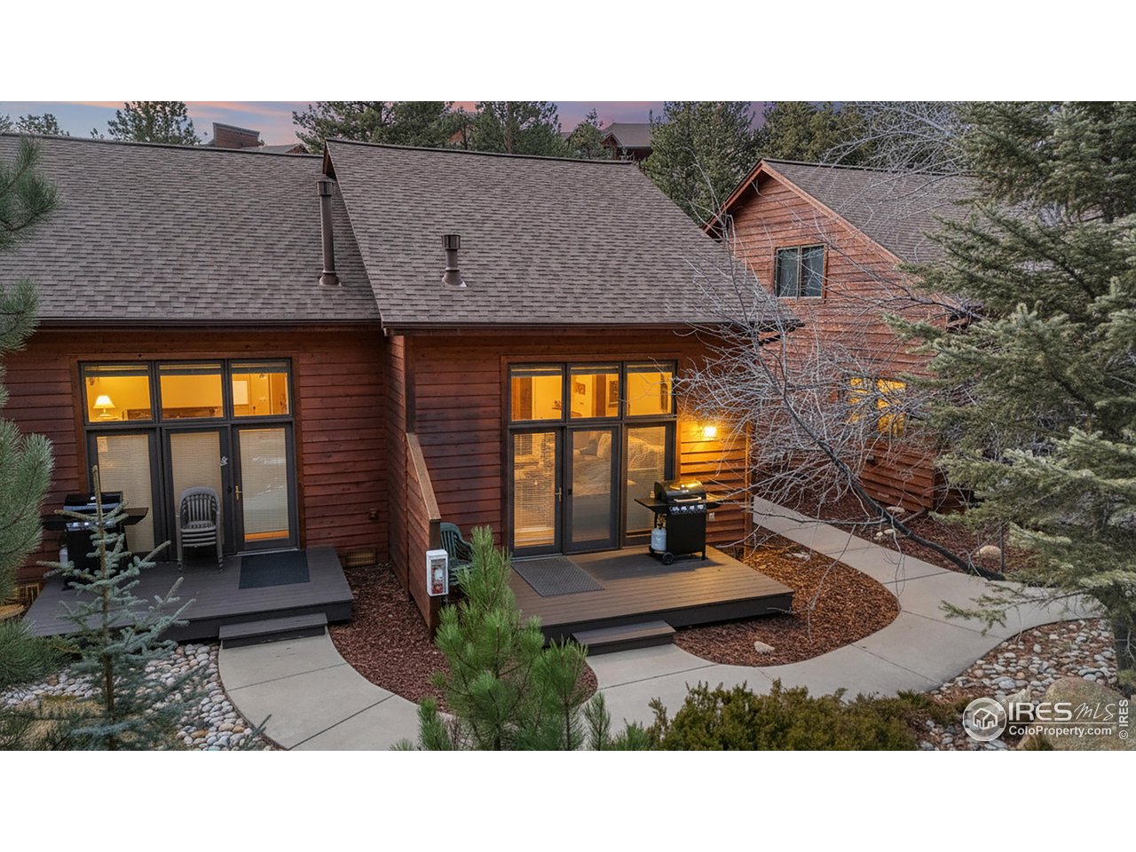 2120 Fall River Road, Unit 2 Estes Park, CO 80517 - Photo 2 of 39 a picture of a house with a yard