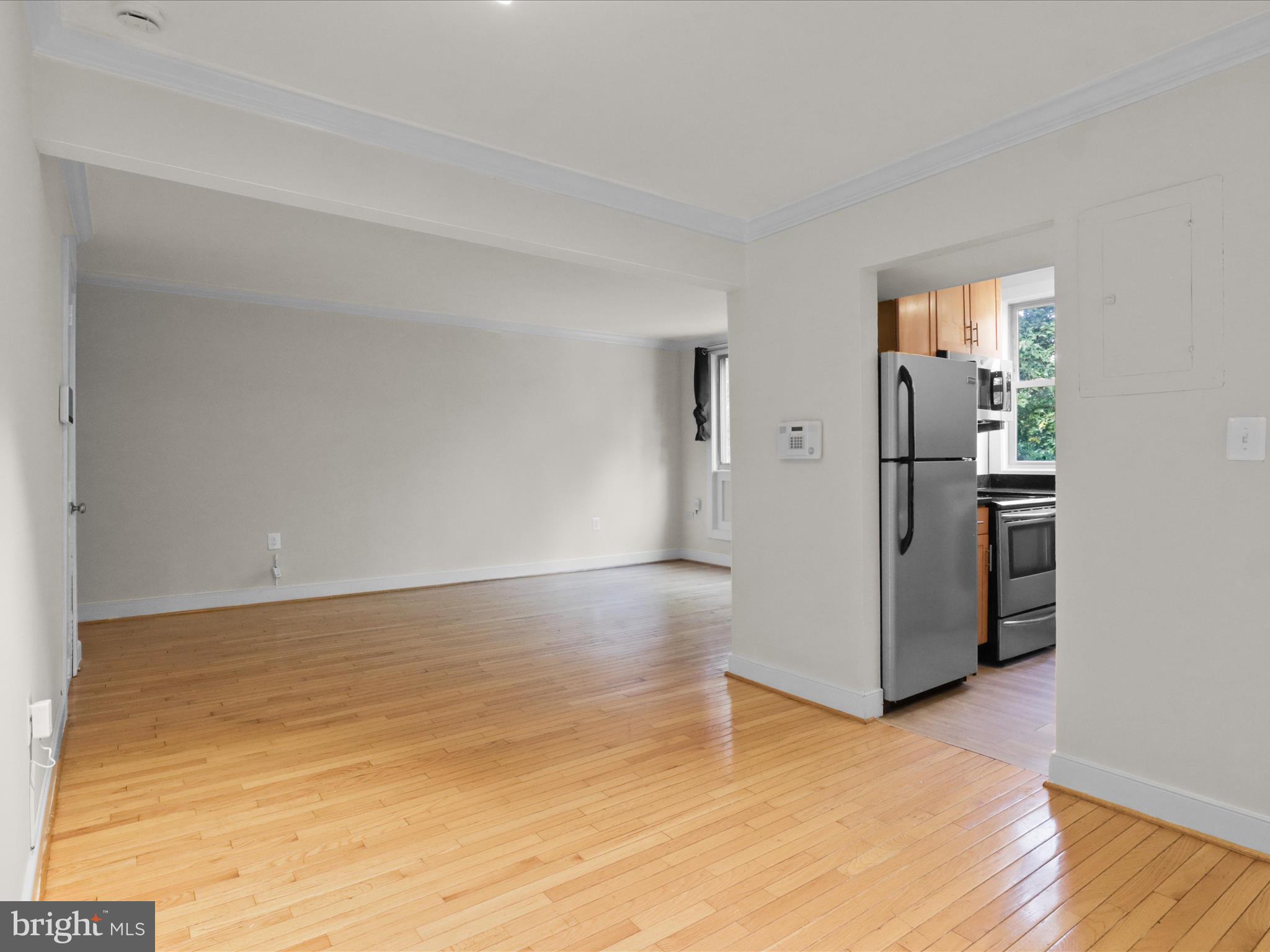 2850 Hartford Street Southeast, Unit 203 Washington, DC 20020 - Photo 6 of 23 Dining room looking into kitchen and living roomn
