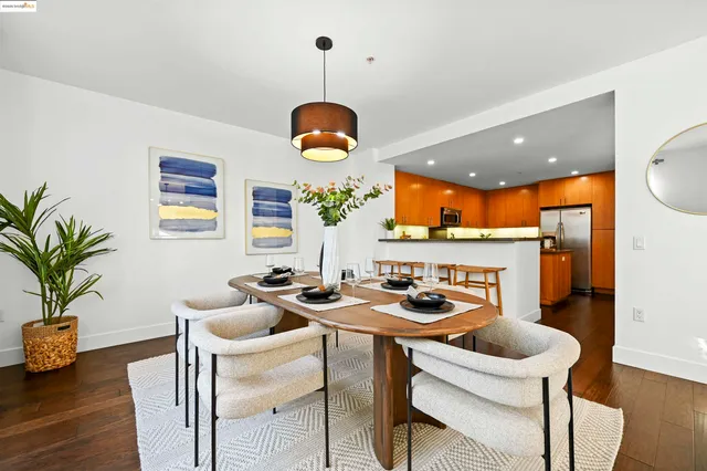 a kitchen with a table and chairs