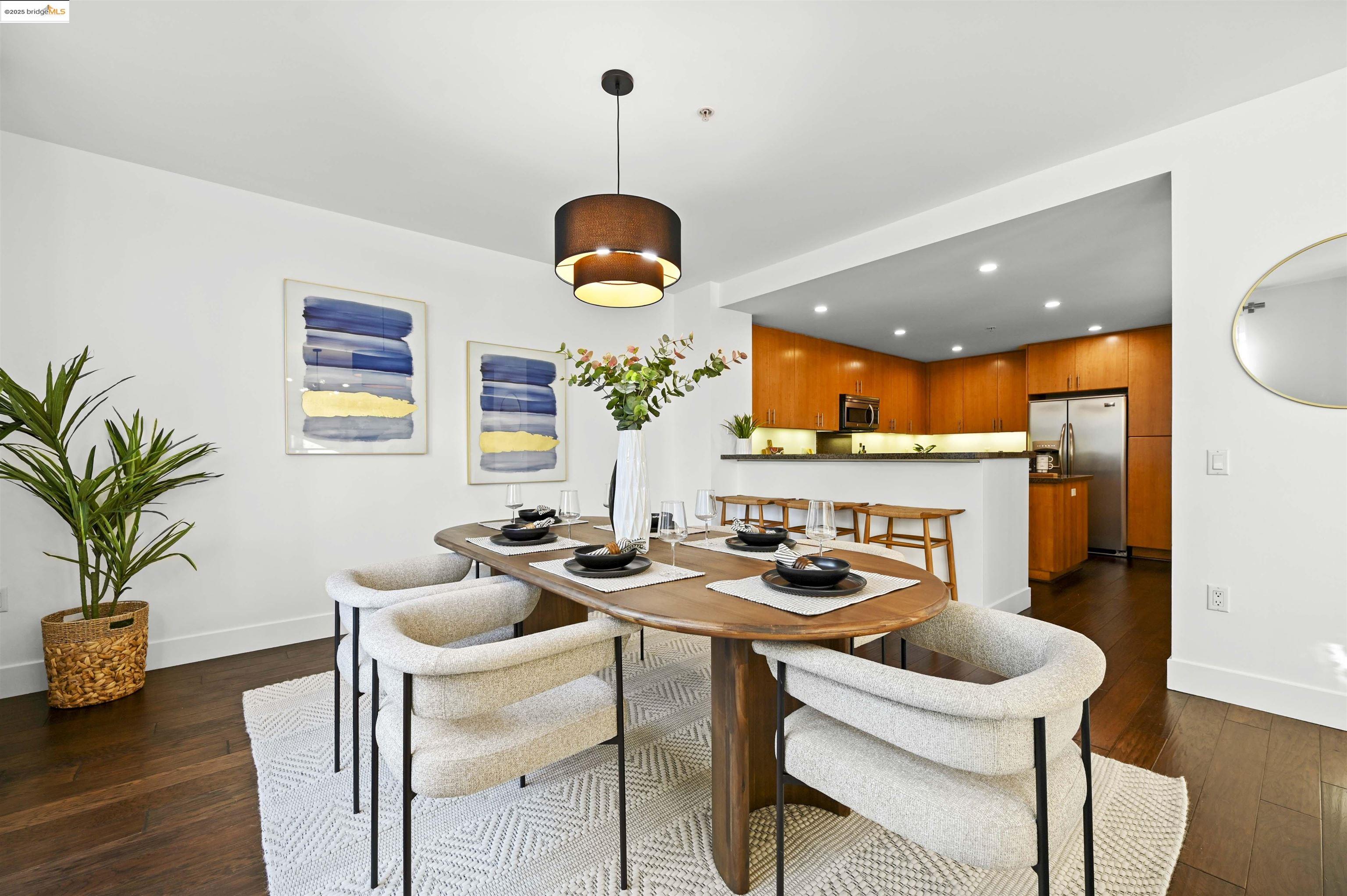 438 West Grand Avenue, Unit 422 Oakland, CA 94612 - Photo 12 of 52 Dining space with recessed lighting and dark wood-type flooring