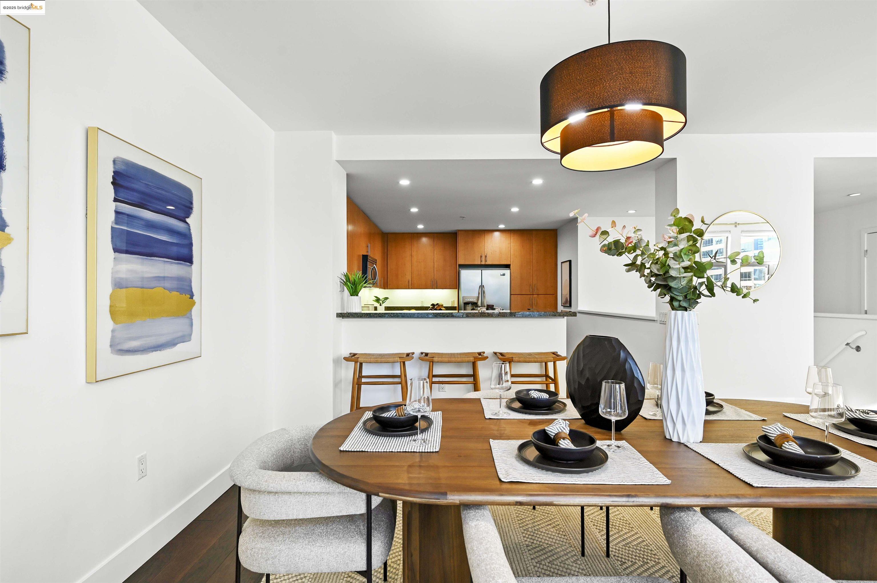 438 West Grand Avenue, Unit 422 Oakland, CA 94612 - Photo 13 of 52 Dining room featuring recessed lighting and dark wood finished floors