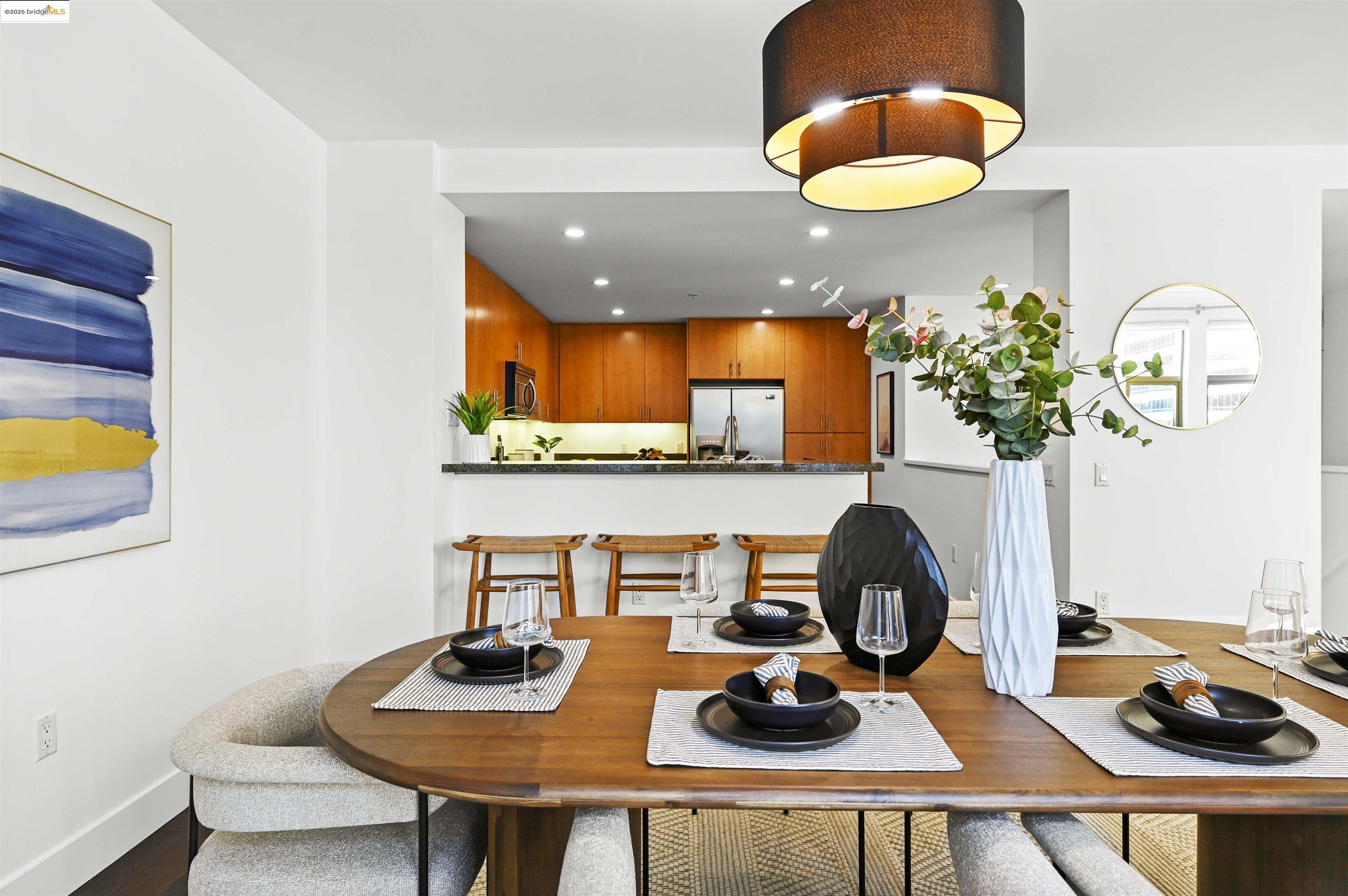 438 West Grand Avenue, Unit 422 Oakland, CA 94612 - Photo 14 of 52 Dining room with recessed lighting and dark wood-type flooring