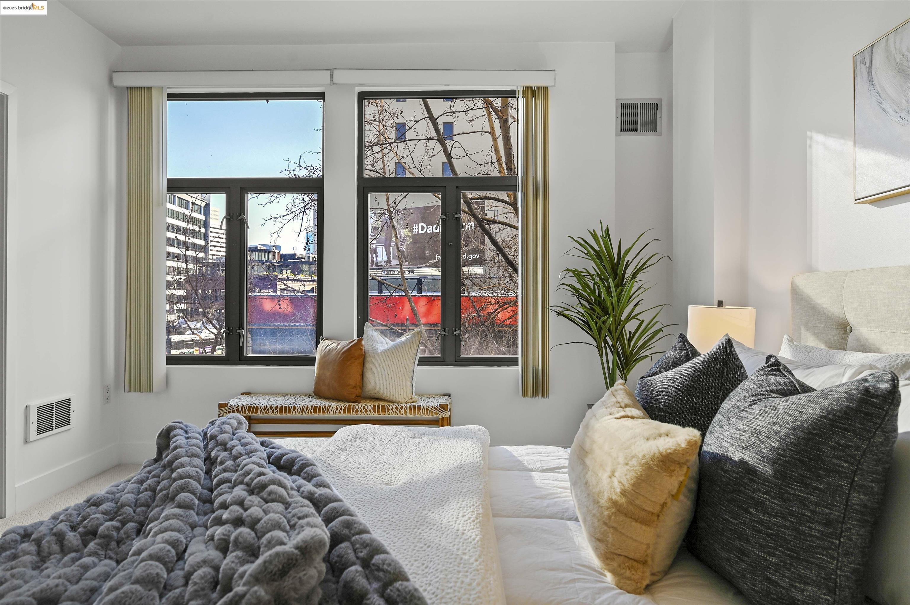 438 West Grand Avenue, Unit 422 Oakland, CA 94612 - Photo 26 of 52 Bedroom with carpet flooring and baseboards