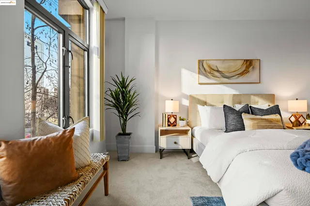 a bed room with a bed and a couch