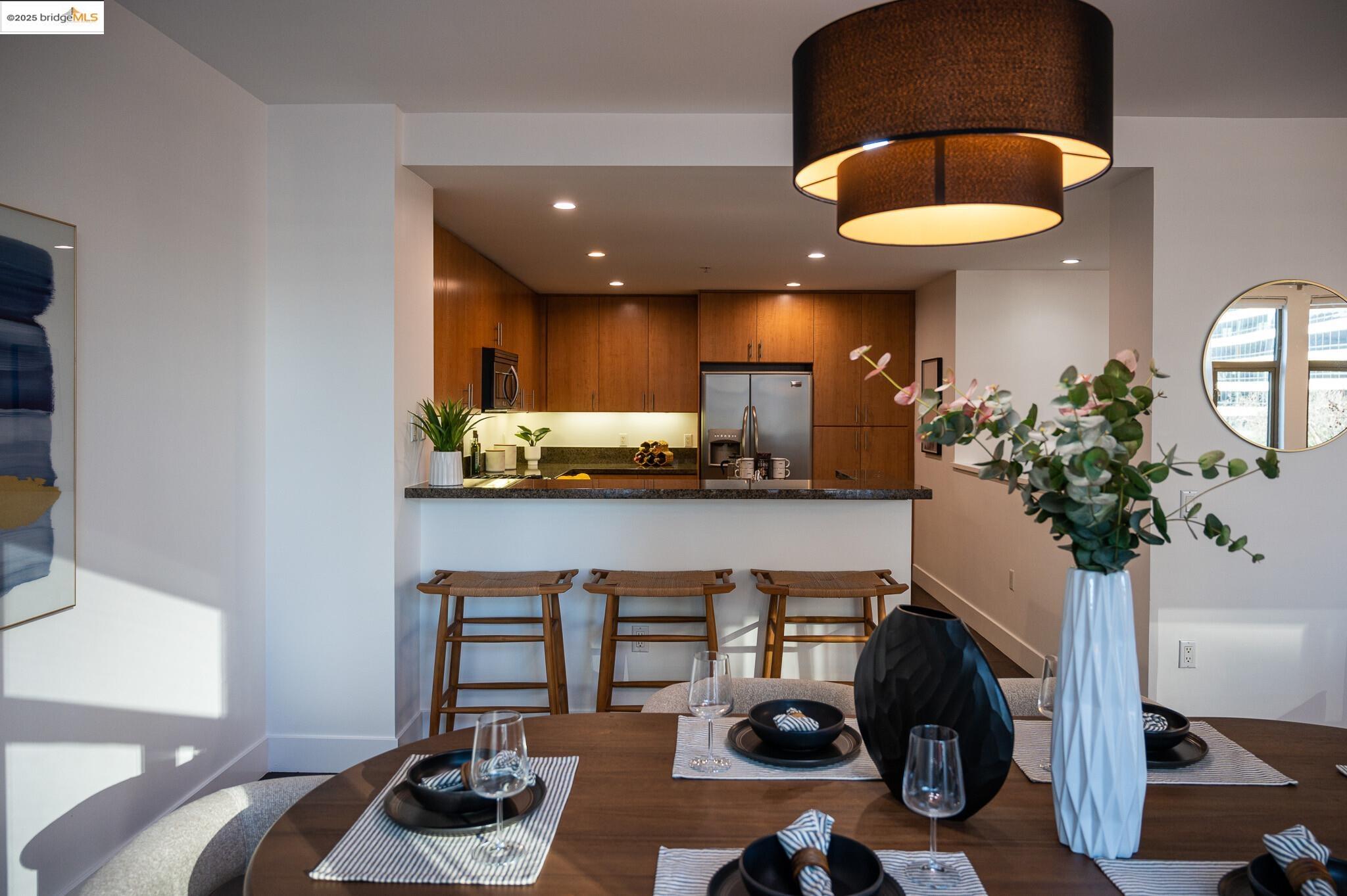 438 West Grand Avenue, Unit 422 Oakland, CA 94612 - Photo 45 of 52 Dining room with baseboards and recessed lighting