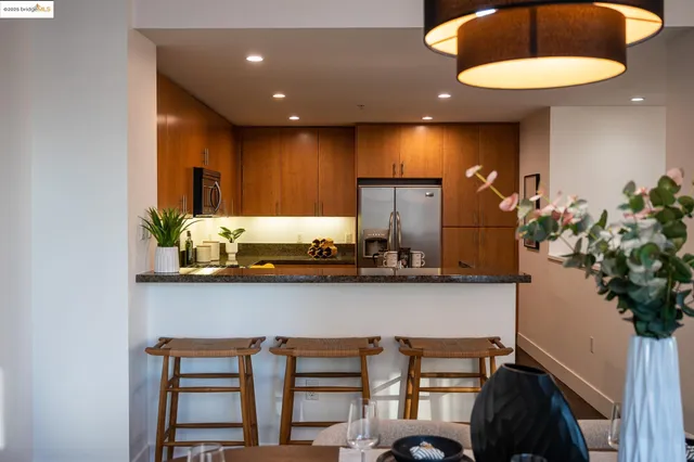 a kitchen with a table and chairs in it