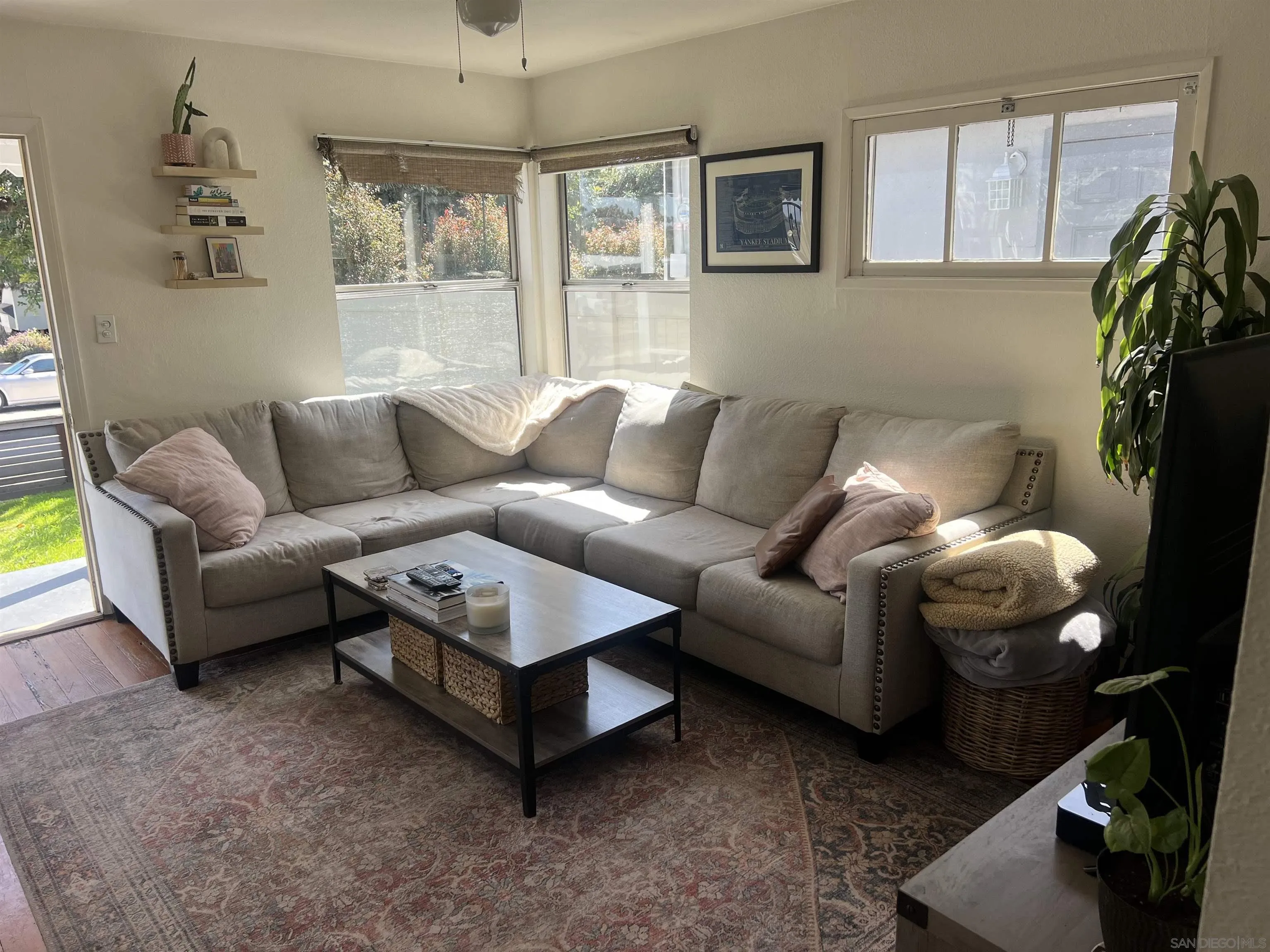 2136 Reed Avenue San Diego, CA 92109 - Photo 15 of 41 a living room with furniture and a window