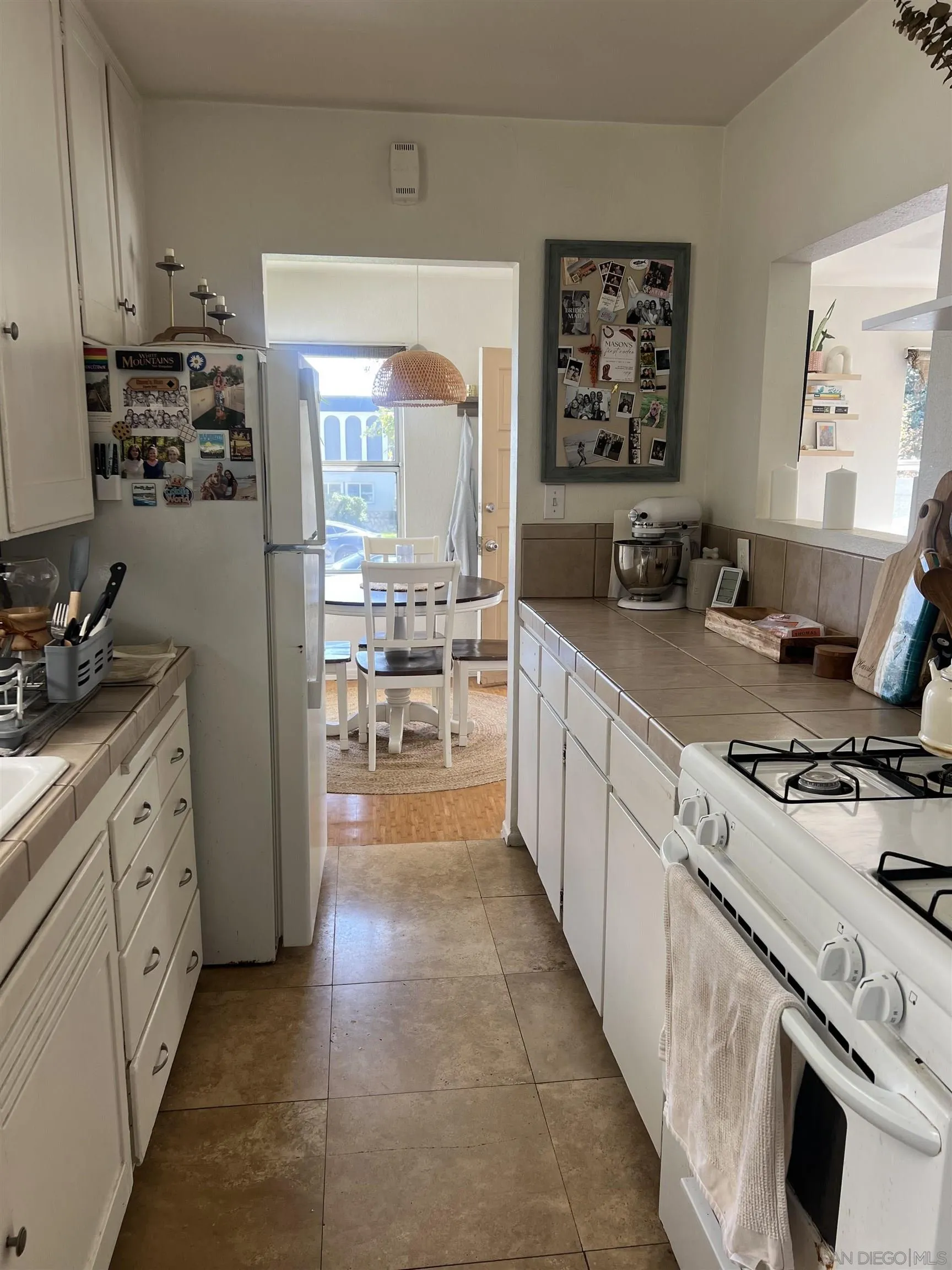 2136 Reed Avenue San Diego, CA 92109 - Photo 26 of 41 a large kitchen with a stove top oven