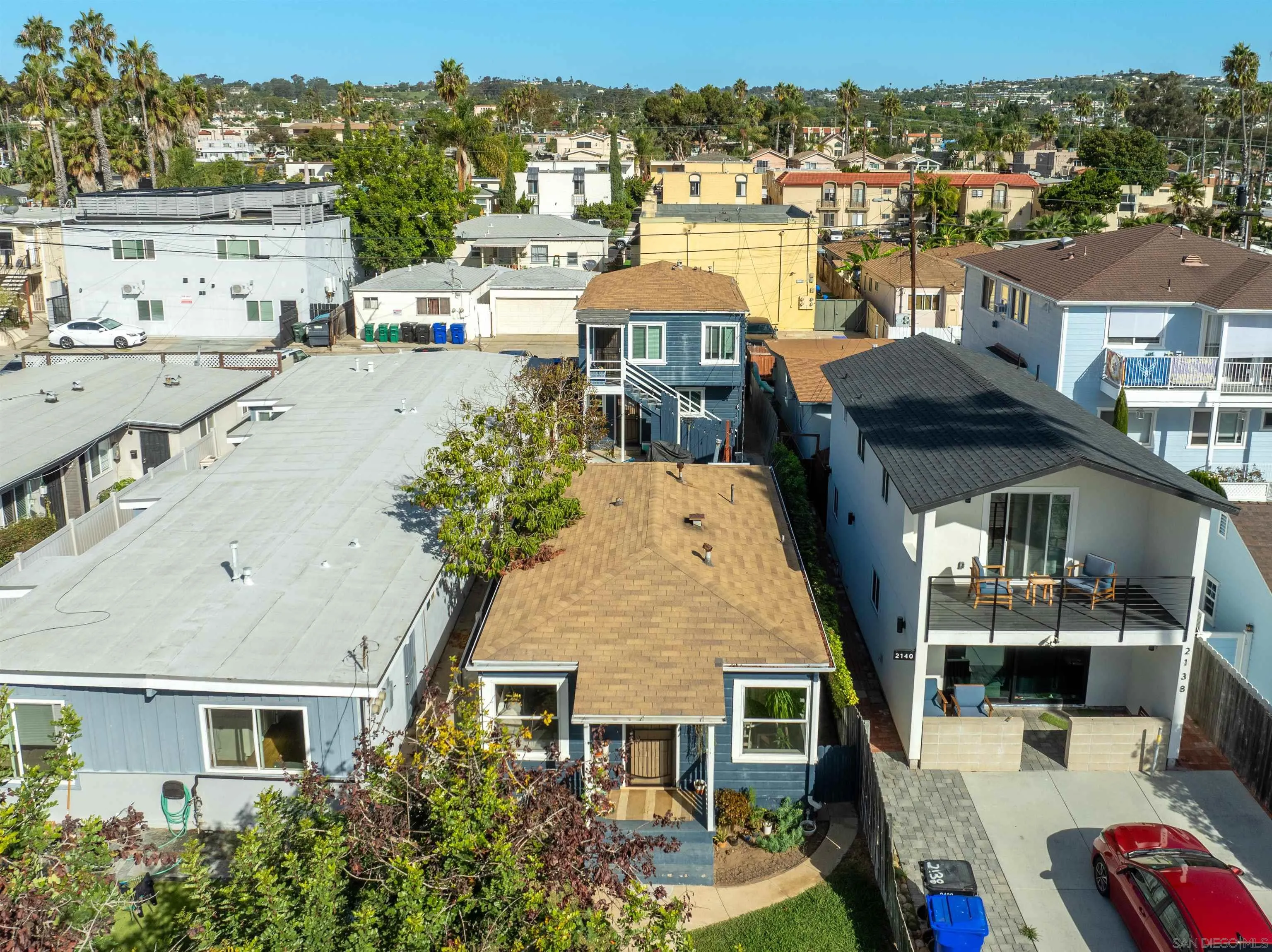 2136 Reed Avenue San Diego, CA 92109 - Photo 5 of 41 a aerial view of a large building and cars parked in front of it