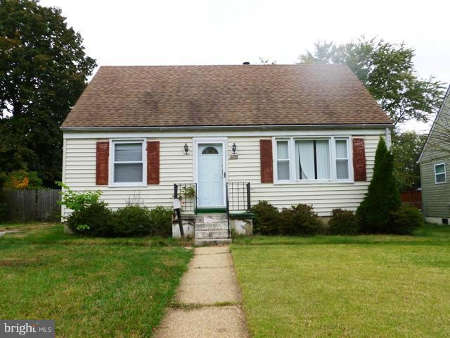 726 Templecliff Road Pikesville, MD 21208 - Photo 1 of 8 a front view of a house with garden