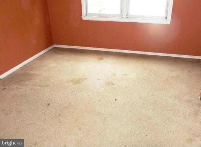 726 Templecliff Road Pikesville, MD 21208 - Photo 5 of 8 a view of a small space with wooden floor