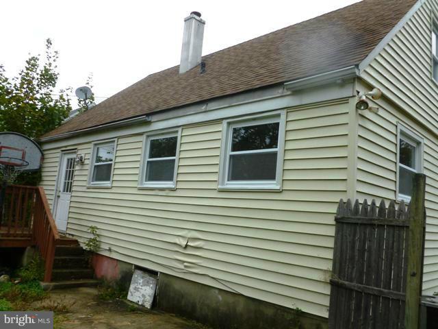 726 Templecliff Road Pikesville, MD 21208 - Photo 8 of 8 a side view of a house