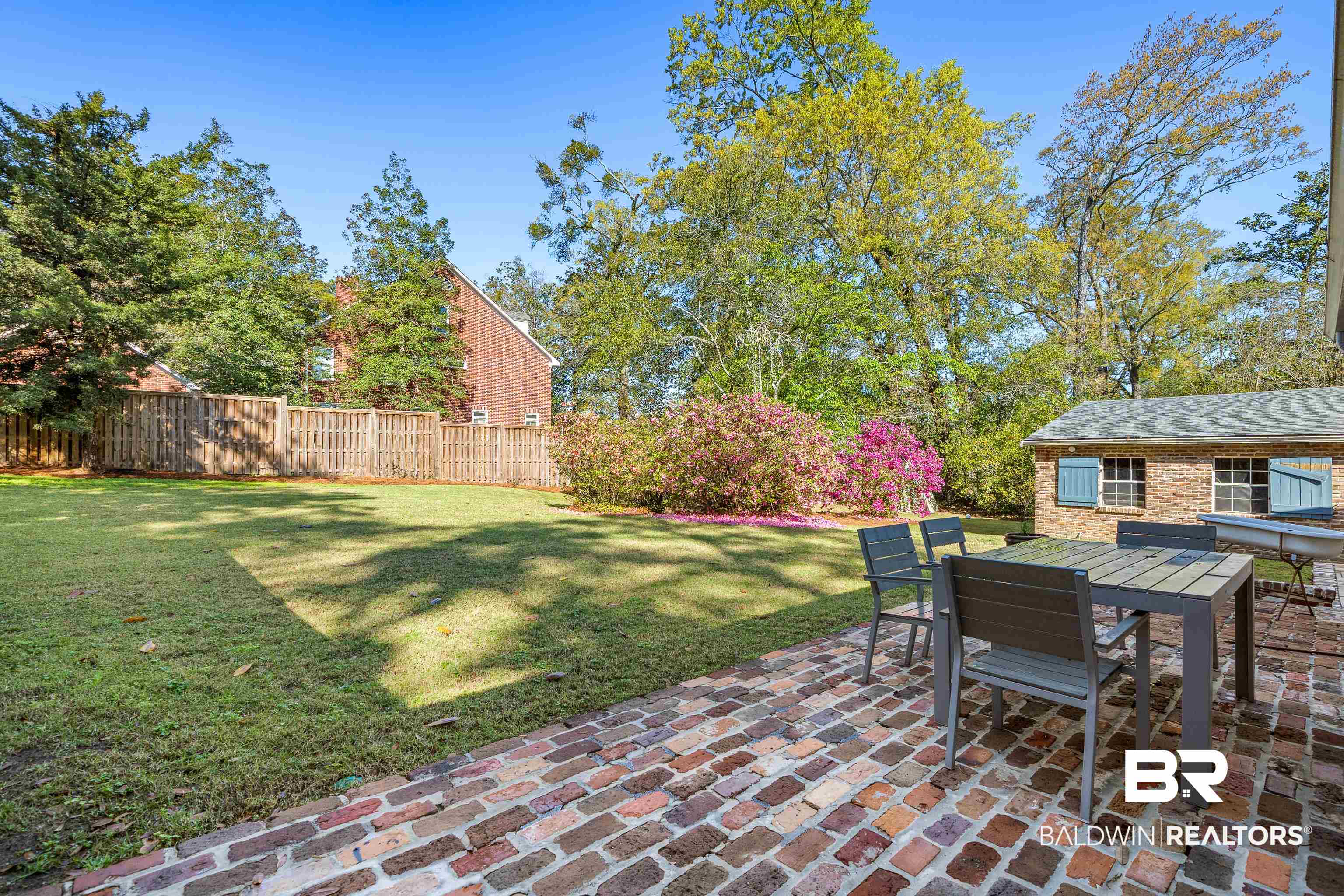 141 Myrtlewood Lane Mobile, AL 36608 - Photo 37 of 44 Exterior space with fence, outdoor dining area, and a patio area
