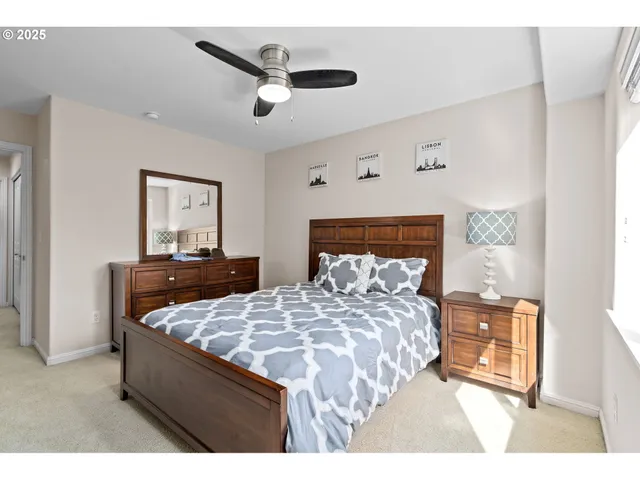 a bed room with a bed and a tv