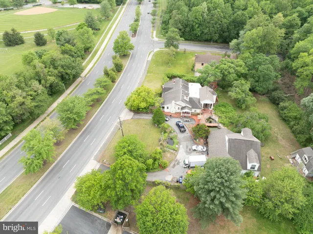 an aerial view of a house with a garden