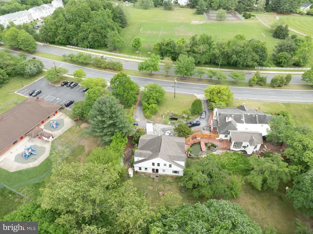 a view of a lake with a yard