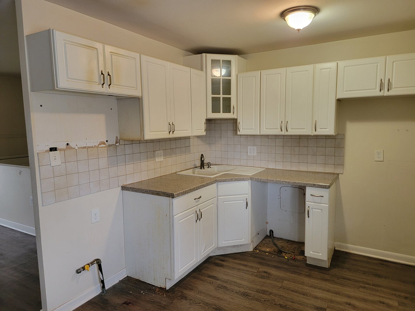 117 South Willow Lane Glenwood, IL 60425 - Photo 11 of 27 a kitchen with stainless steel appliances granite countertop a sink stove and cabinets