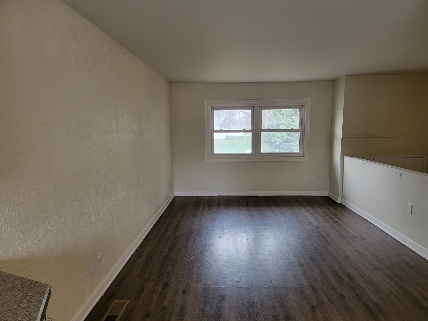 117 South Willow Lane Glenwood, IL 60425 - Photo 13 of 27 an empty room with wooden floor and windows