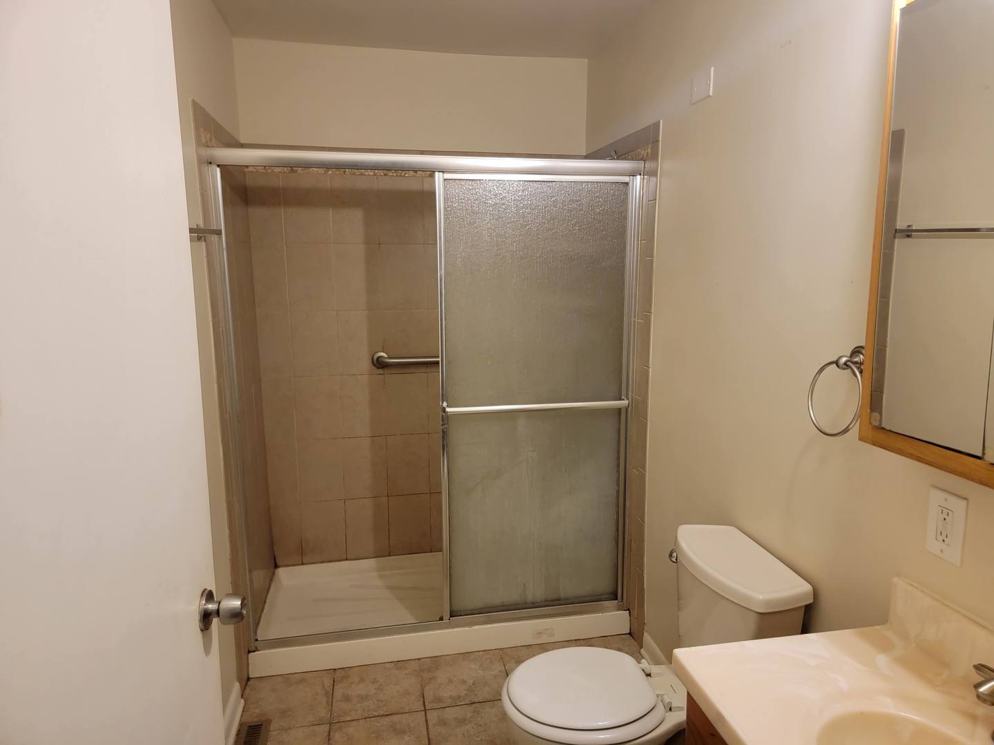 117 South Willow Lane Glenwood, IL 60425 - Photo 16 of 27 a bathroom with a toilet and a shower