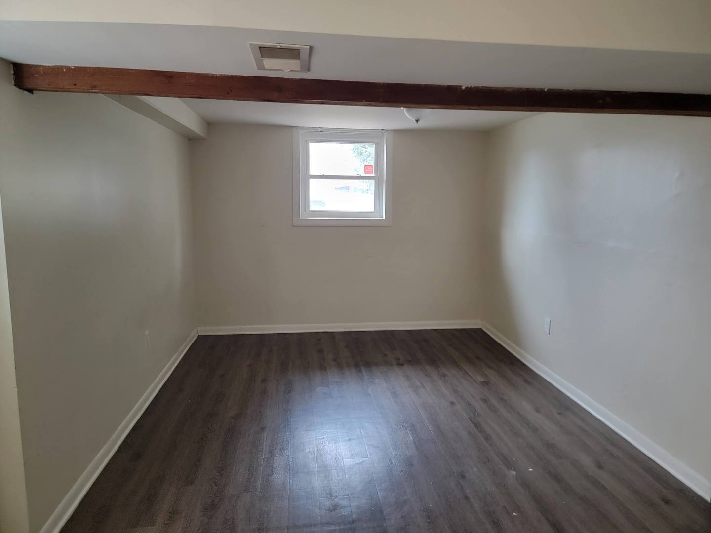 117 South Willow Lane Glenwood, IL 60425 - Photo 21 of 27 a view of a small space with wooden floor and a window