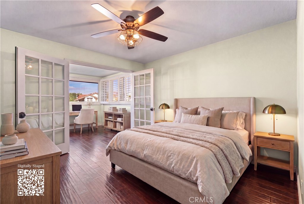 21732 Exton Way Lake Forest, CA 92630 - Photo 30 of 52 Top floor bedroom with bonus office space. Ceiling fan and french doors. Virtually staged, find originals at https://bit.ly/3OvKmPn
