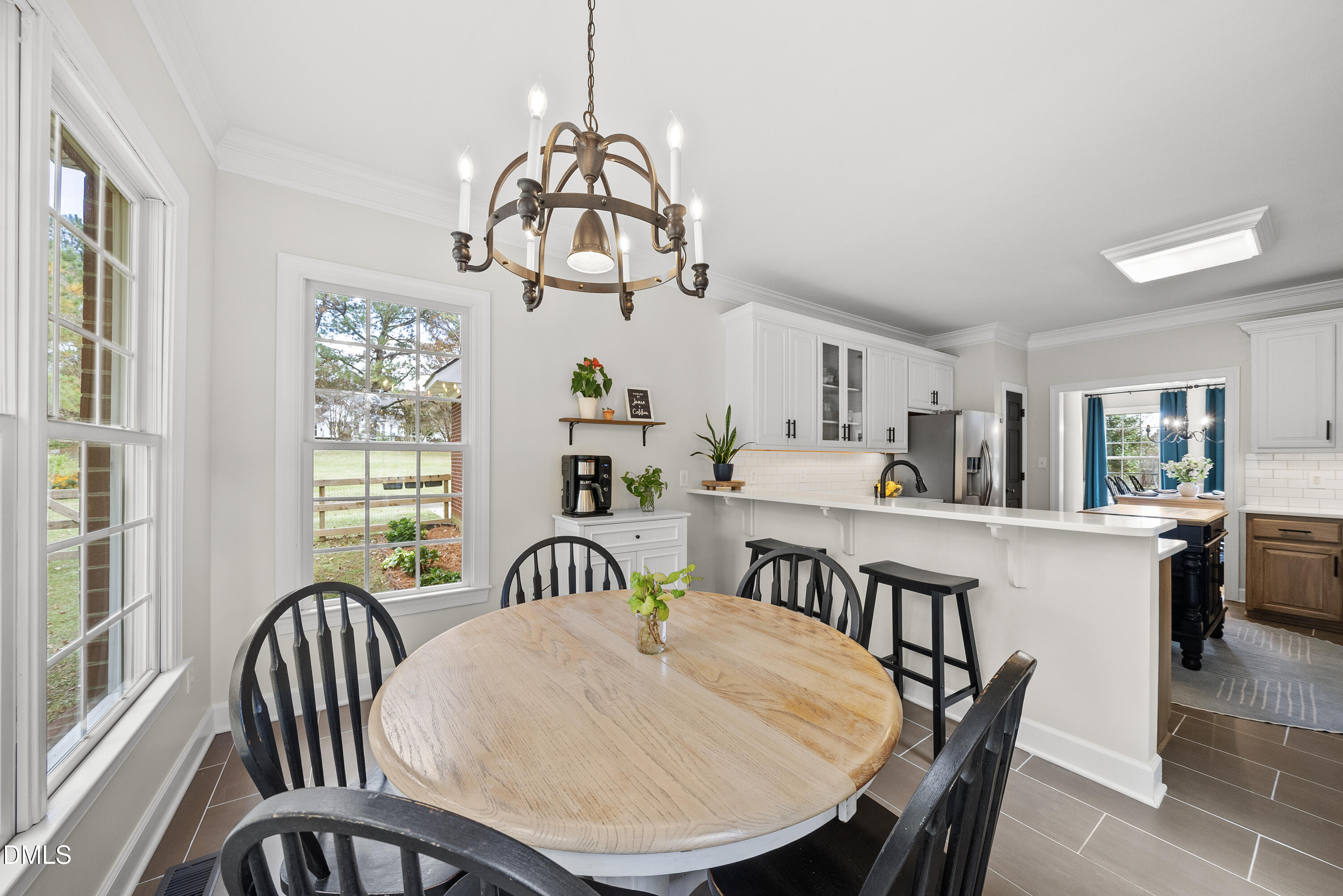 72 Clover Ridge Angier, NC 27501 - Photo 16 of 47 a view of a dining room with furniture window and wooden floor