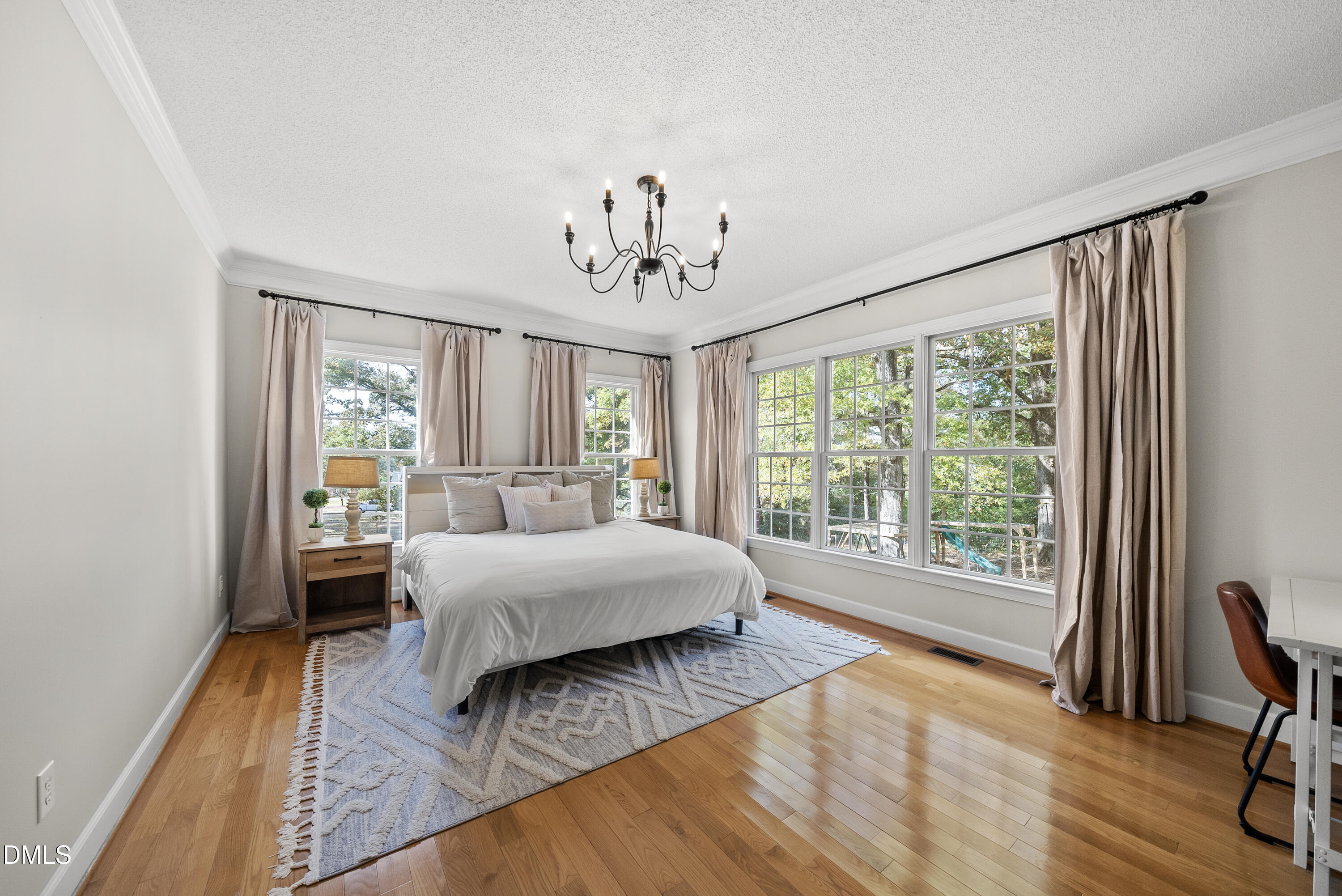 72 Clover Ridge Angier, NC 27501 - Photo 18 of 47 a spacious bedroom with a large bed and a window