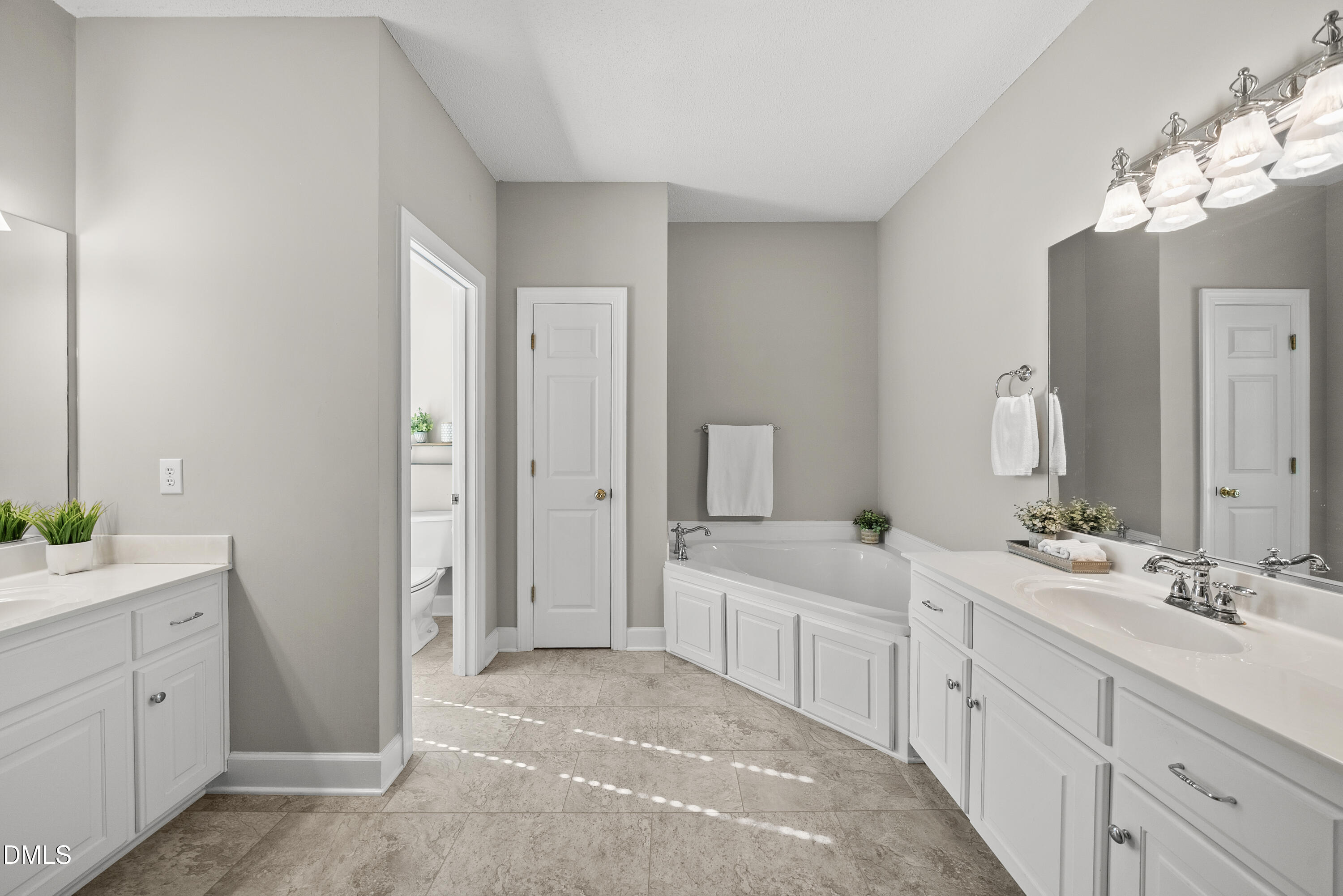 72 Clover Ridge Angier, NC 27501 - Photo 19 of 47 a spacious bathroom with a double vanity sink mirror and