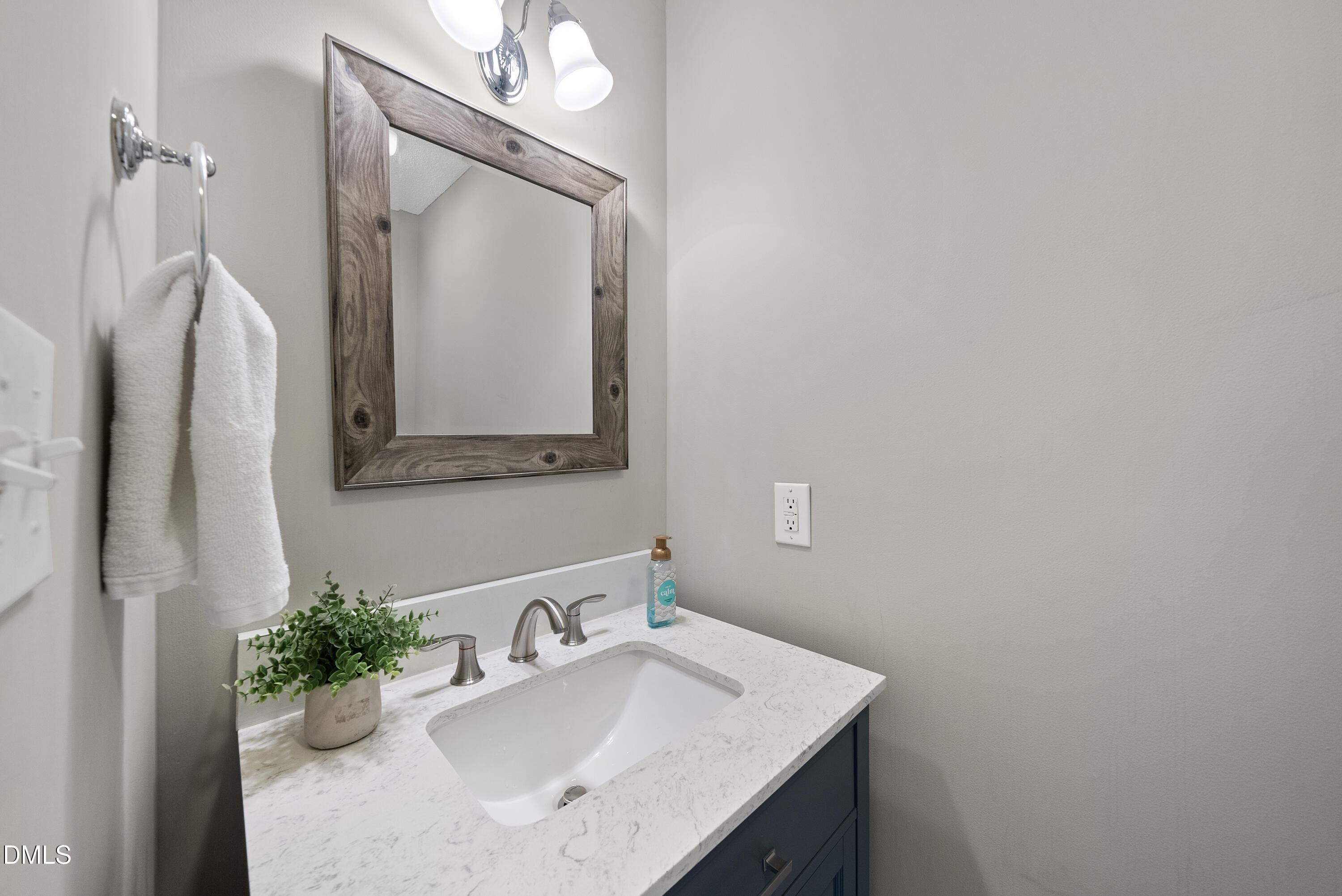 72 Clover Ridge Angier, NC 27501 - Photo 37 of 47 a bathroom with a sink vanity and a mirror