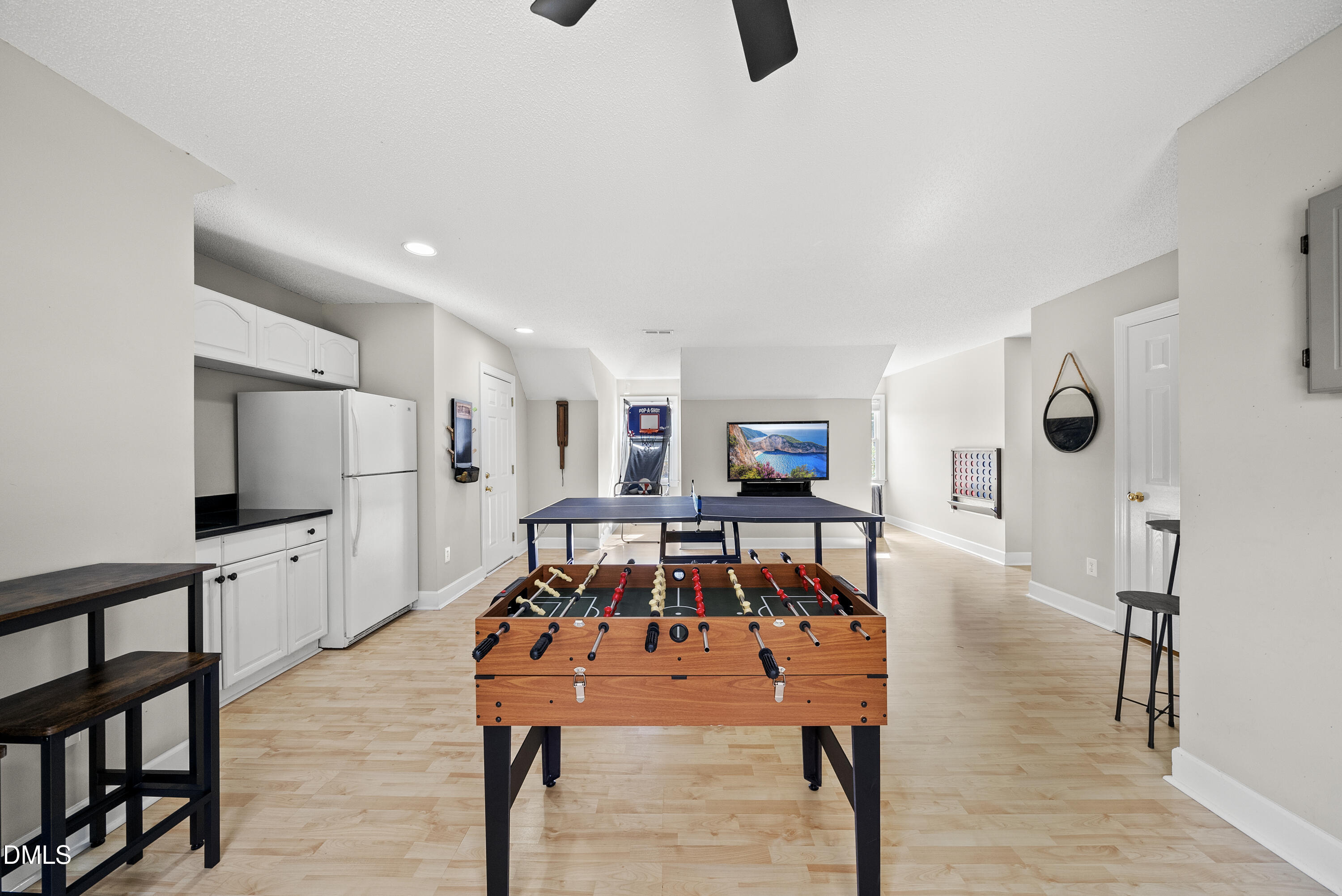 72 Clover Ridge Angier, NC 27501 - Photo 41 of 47 a living room with furniture and a flat screen tv