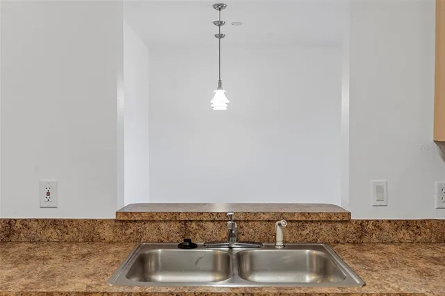 a view of a sink and dishwasher