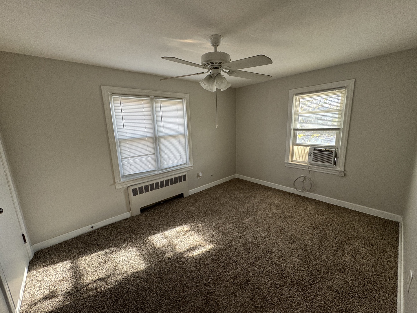 1111 Lincoln Street, Unit 2 Lockport, IL 60441 - Photo 15 of 23 a view of an empty room with a window
