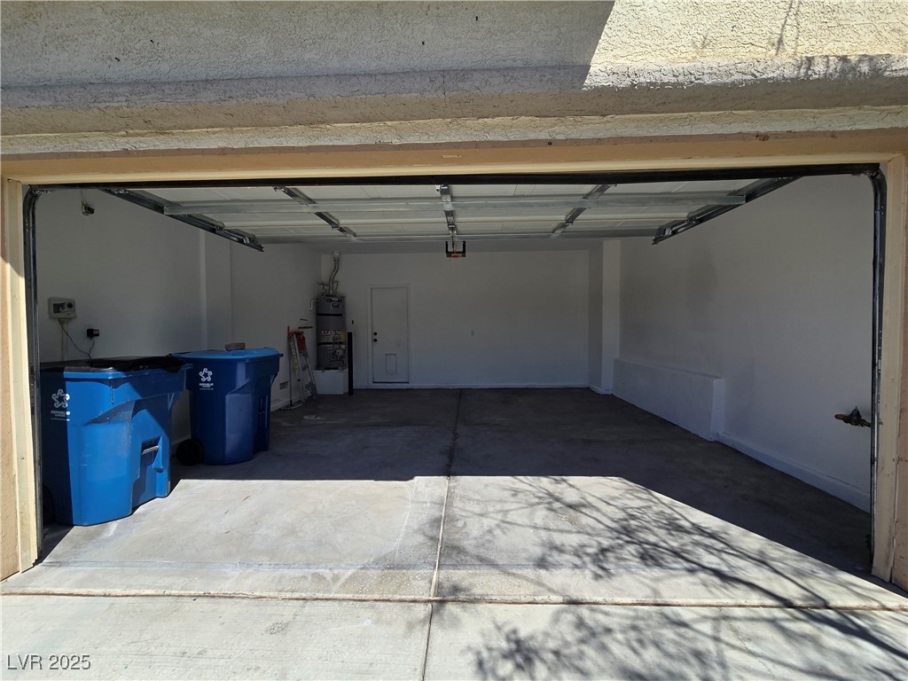 9560 Parker Springs Court Las Vegas, NV 89166 - Photo 33 of 37 Garage with water heater