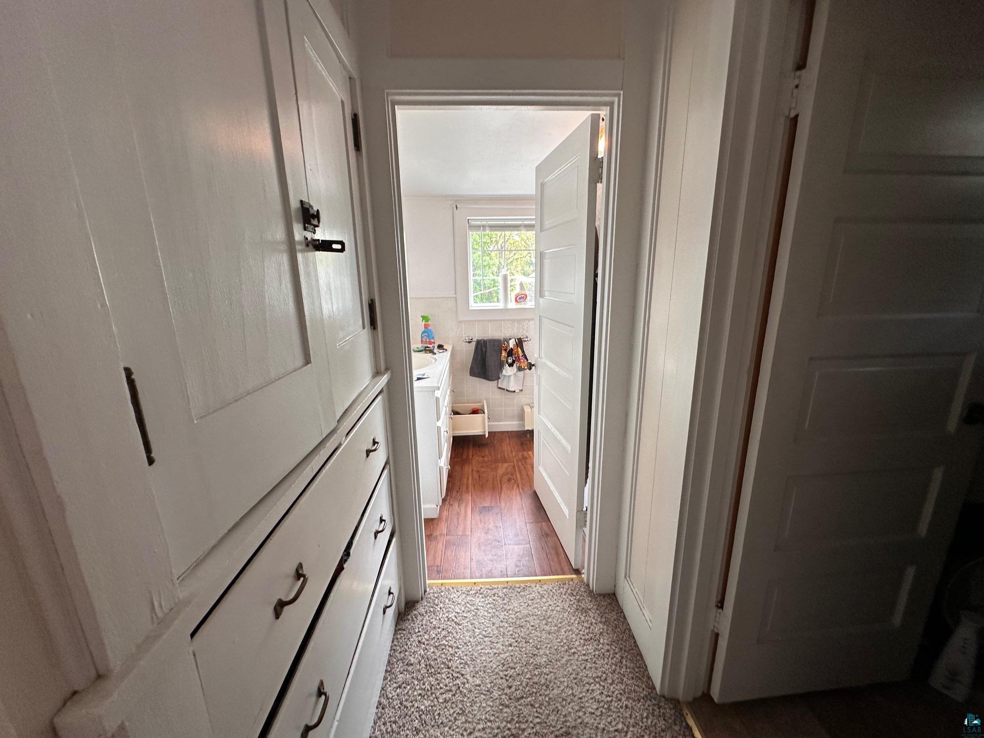 1601 4th Avenue International Falls, MN 56649 - Photo 29 of 50 Hallway featuring carpet floors