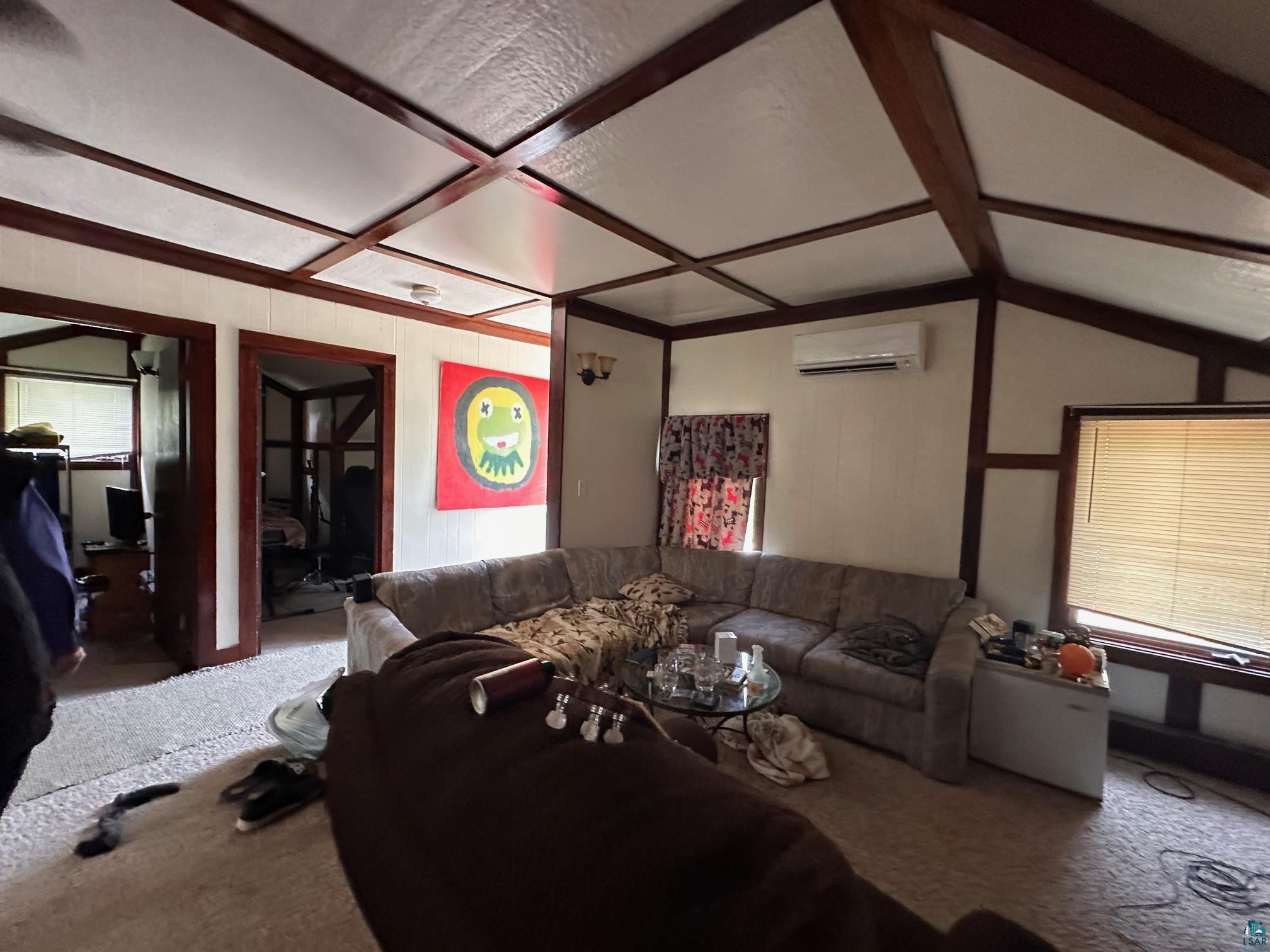 1601 4th Avenue International Falls, MN 56649 - Photo 36 of 50 Carpeted living area with an AC wall unit