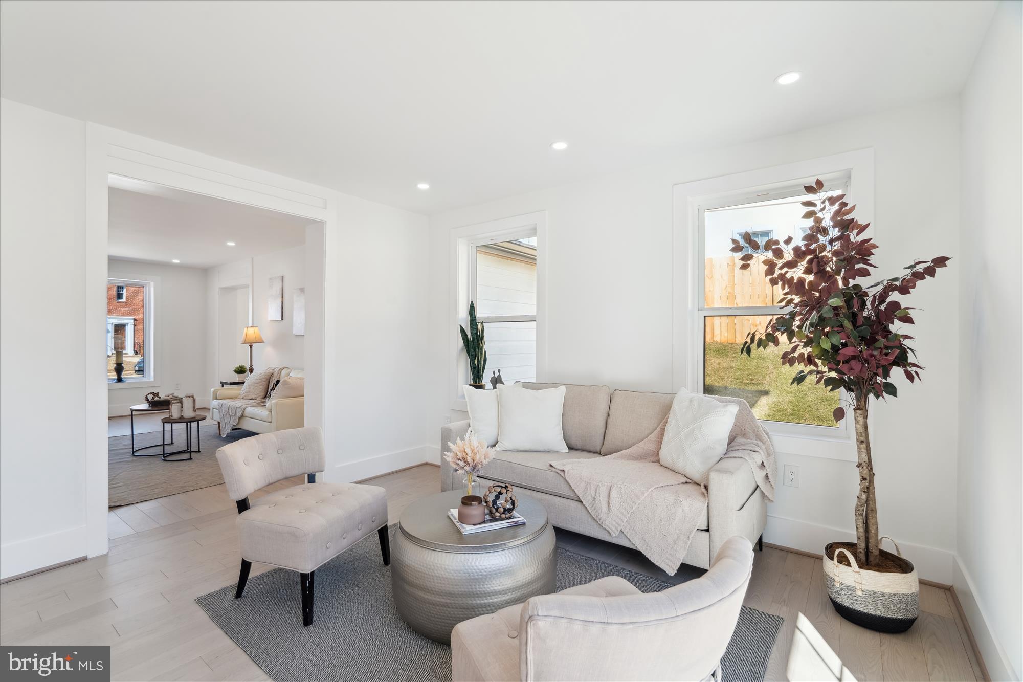 10011 Sidney Road Silver Spring, MD 20901 - Photo 16 of 35 a living room with furniture and a potted plant