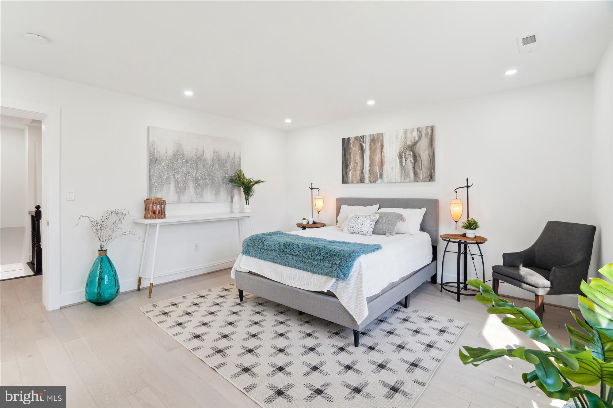 10011 Sidney Road Silver Spring, MD 20901 - Photo 20 of 35 a bedroom with a bed and a couch