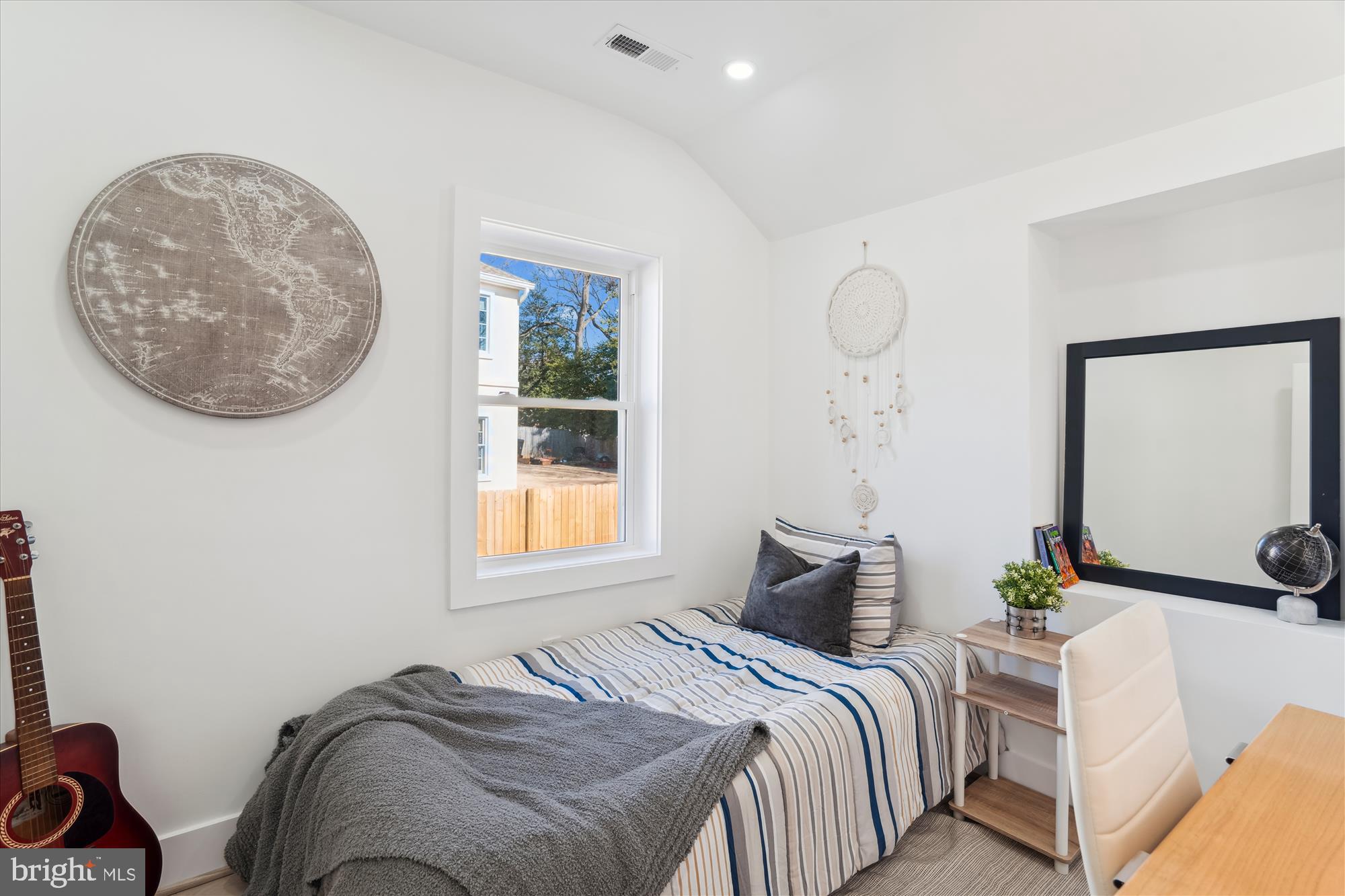 10011 Sidney Road Silver Spring, MD 20901 - Photo 27 of 35 a bed room with a bed mirror and a window