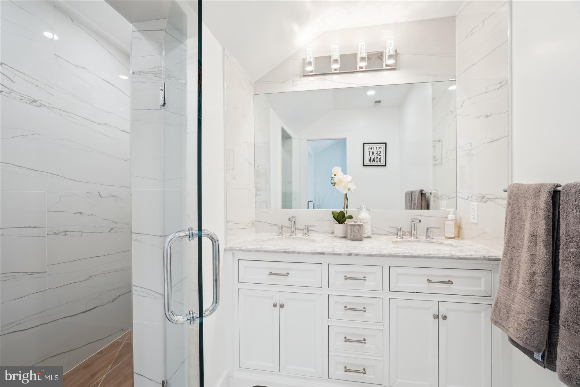 10011 Sidney Road Silver Spring, MD 20901 - Photo 30 of 35 a bathroom with a granite countertop sink and a mirror
