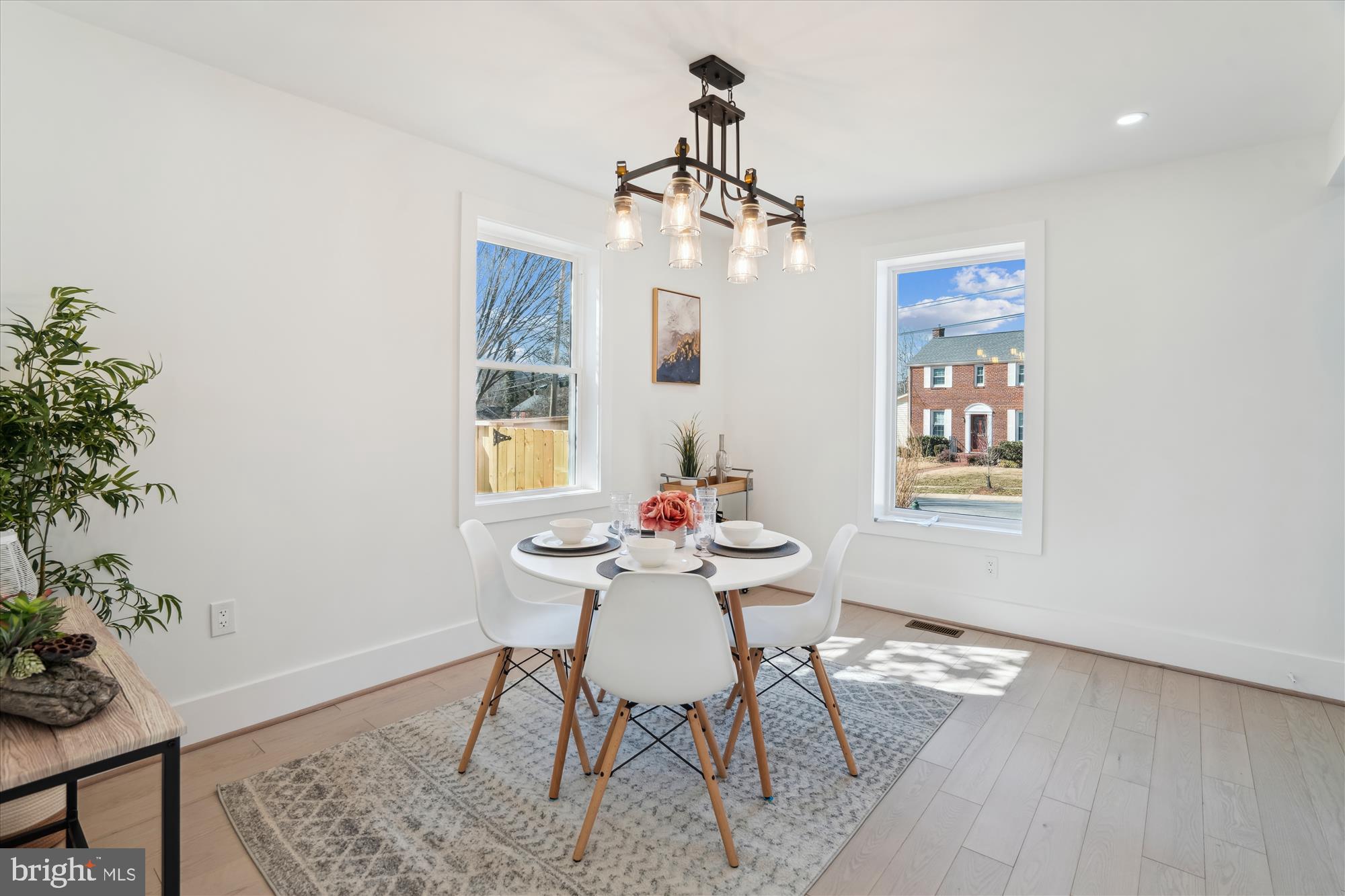 10011 Sidney Road Silver Spring, MD 20901 - Photo 10 of 35 a dining room with wooden floor and breakfast area