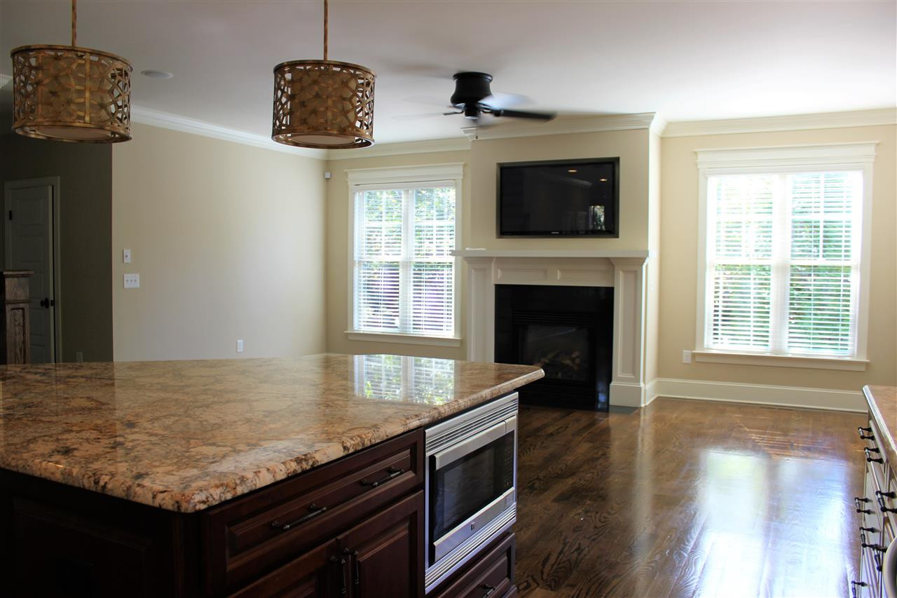 8500 Briarthorne Place Raleigh, NC 27613 - Photo 9 of 30 View of Fireplace from Kitchen