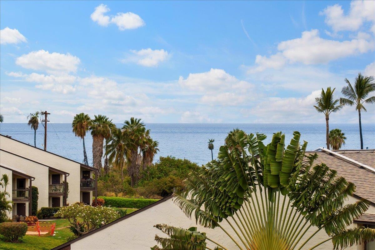 2737 South Kihei Road, Unit 330 Kihei, HI 96753 - Photo 3 of 44 a view of a house with a yard and potted plants