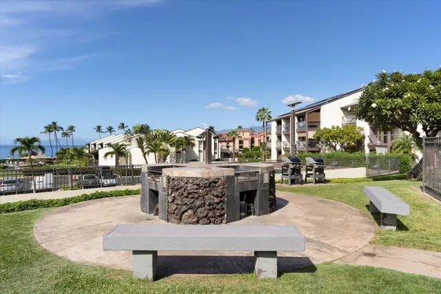 an aerial view of a house with a lake view