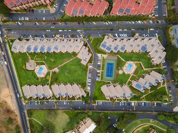 an aerial view of a house with a lake view