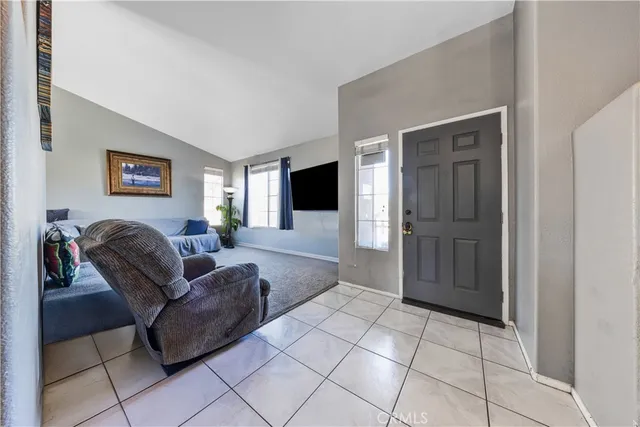 a living room with furniture and a couch