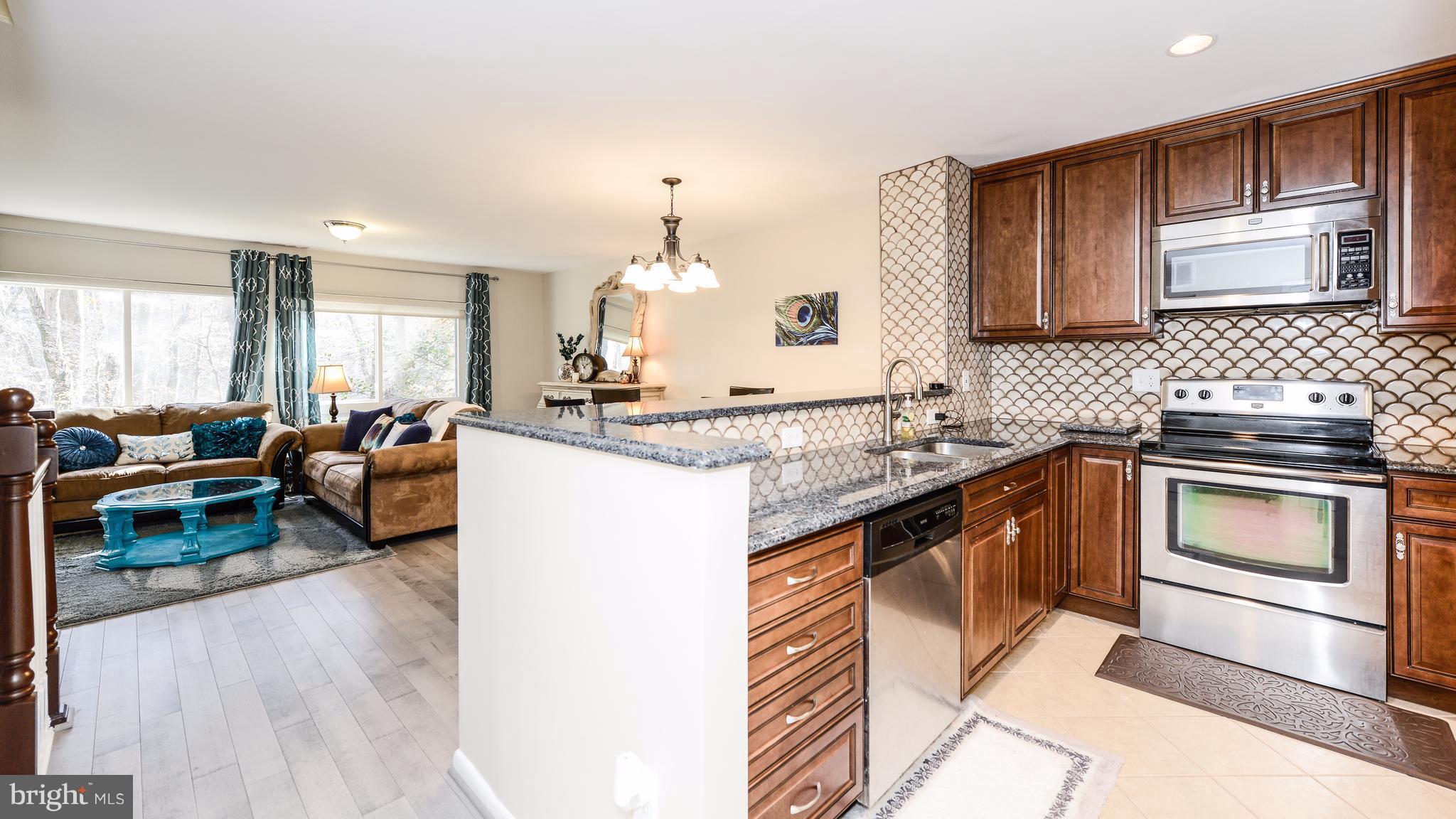 2281 Chestnut Burr Court Reston, VA 20191 - Photo 9 of 27 Kitchen open to dining room