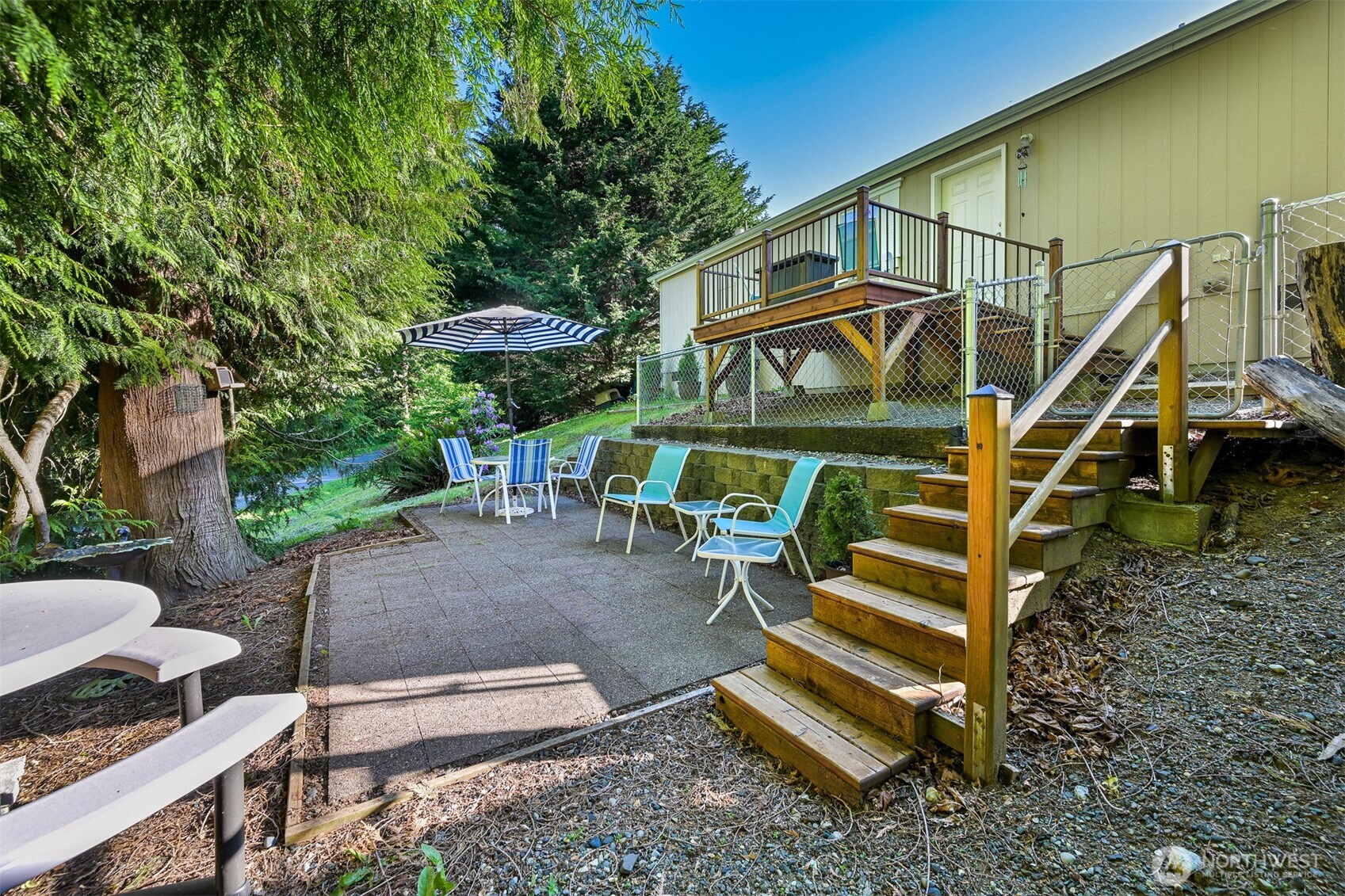 2174 Yew Street Road, Unit 22 Bellingham, WA 98229 - Photo 30 of 36 a view of a house with backyard and sitting area