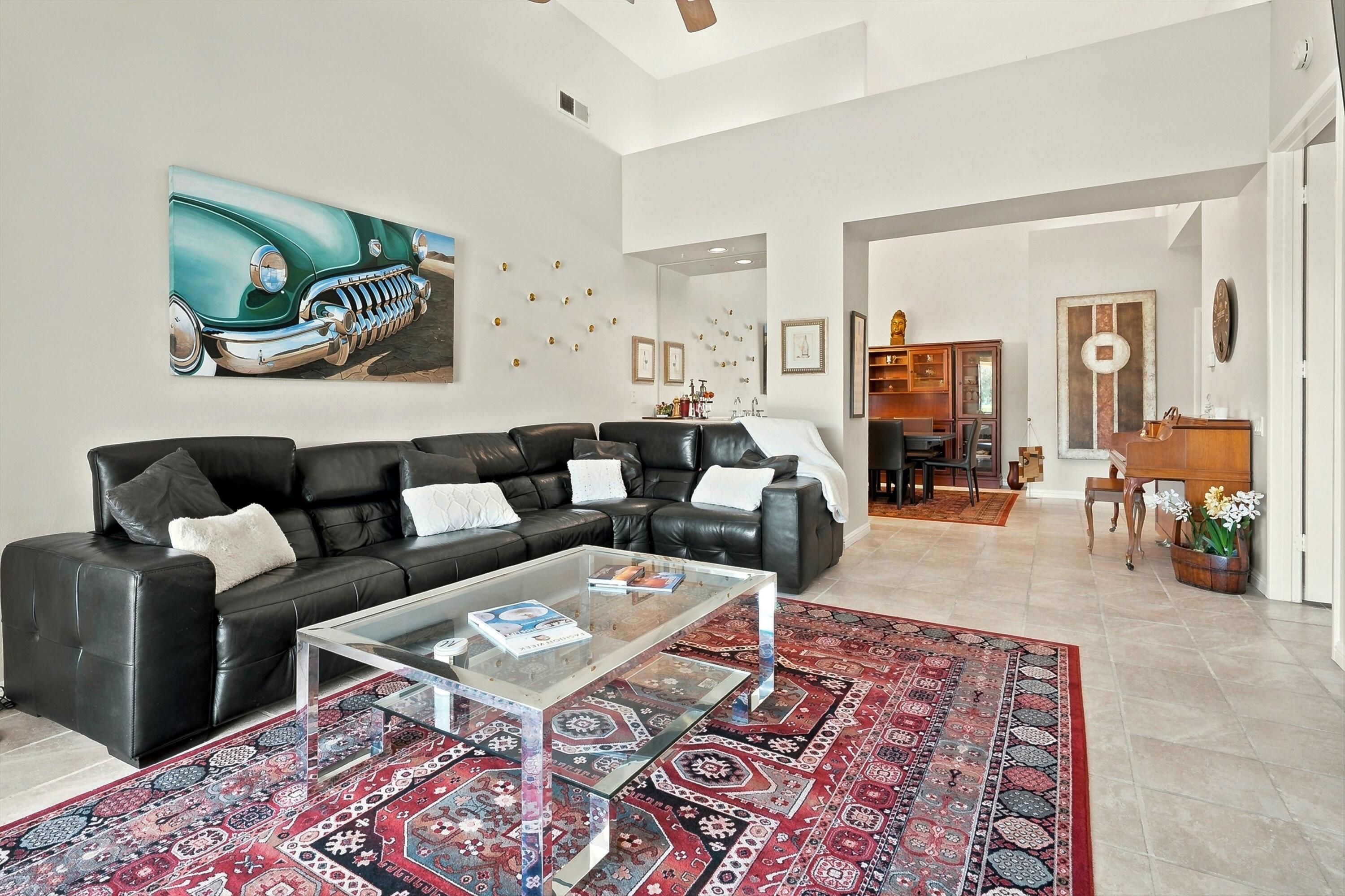 138 Lakeshore Drive Rancho Mirage, CA 92270 - Photo 13 of 30 a living room with furniture and a couch