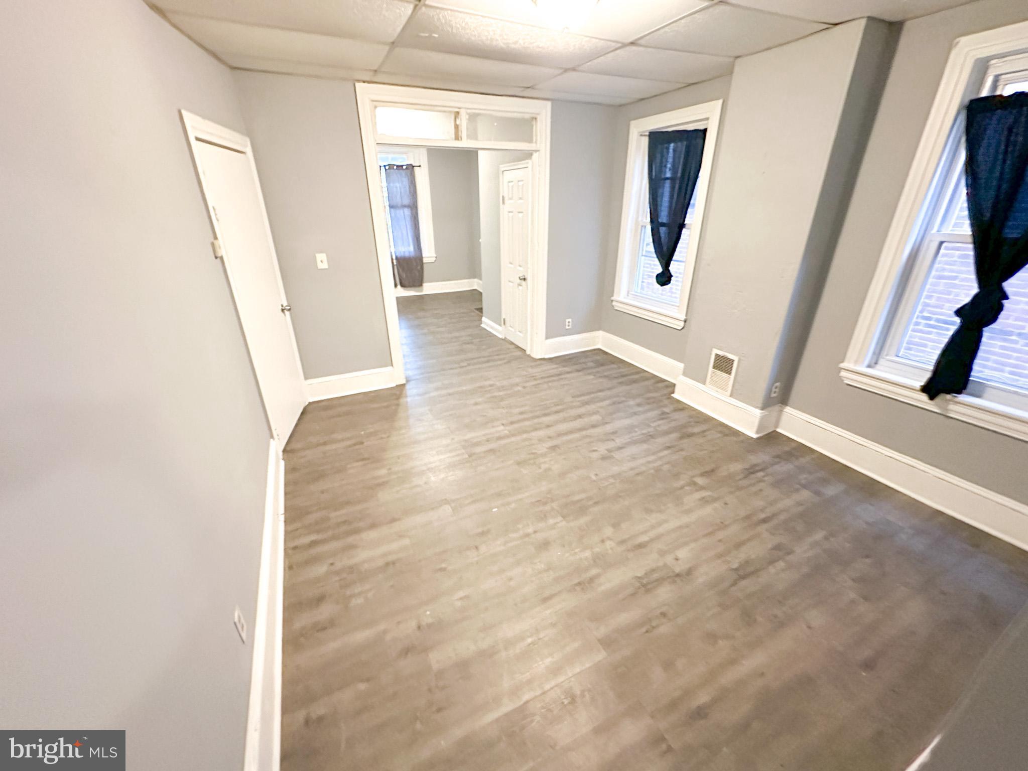 330 North 53rd Street Philadelphia, PA 19139 - Photo 7 of 20 a view of a hallway with wooden floor and stairs